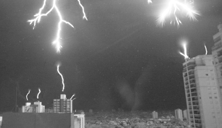 image showing lightning rods shooting lightning upwards